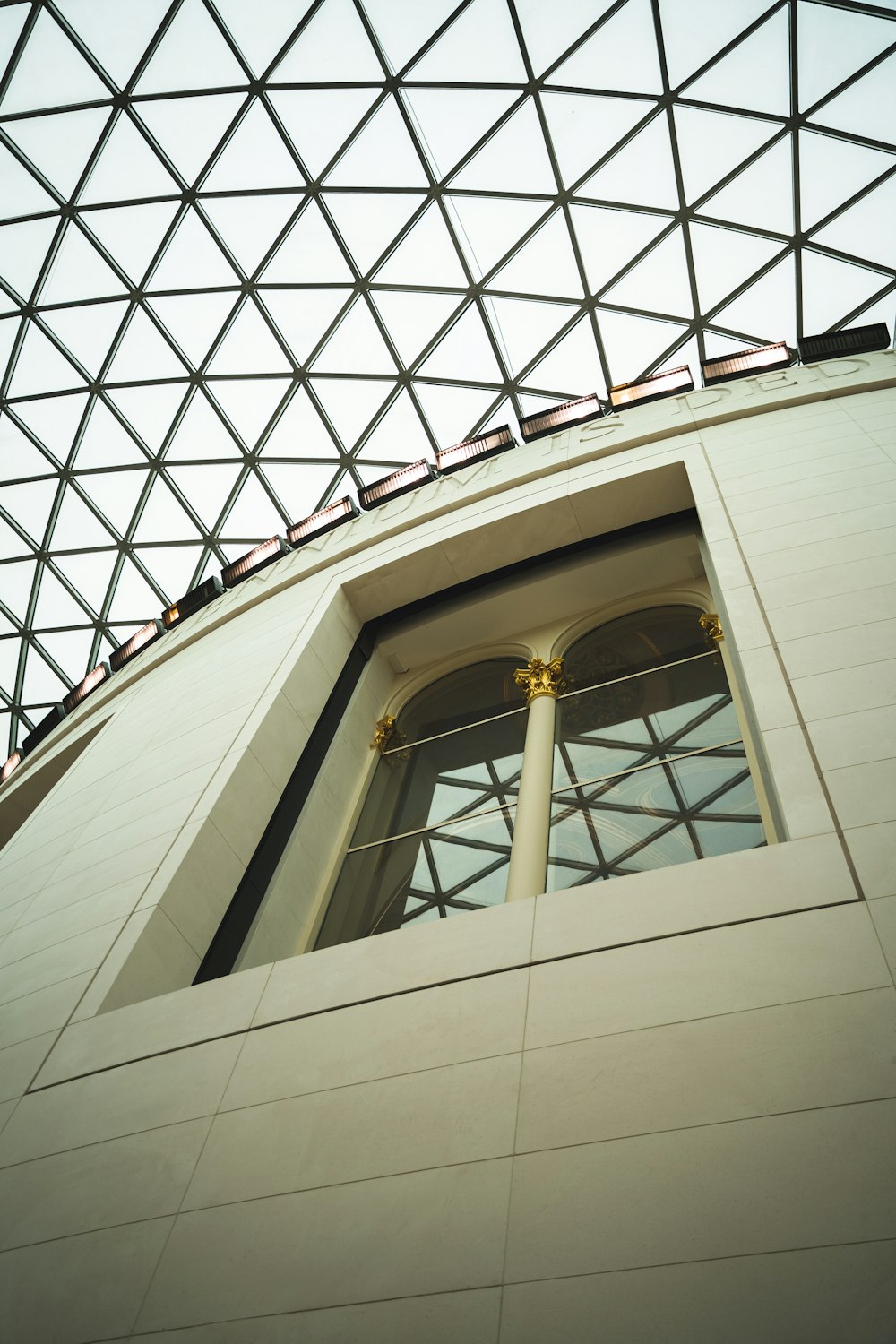 a window in a building with a glass roof