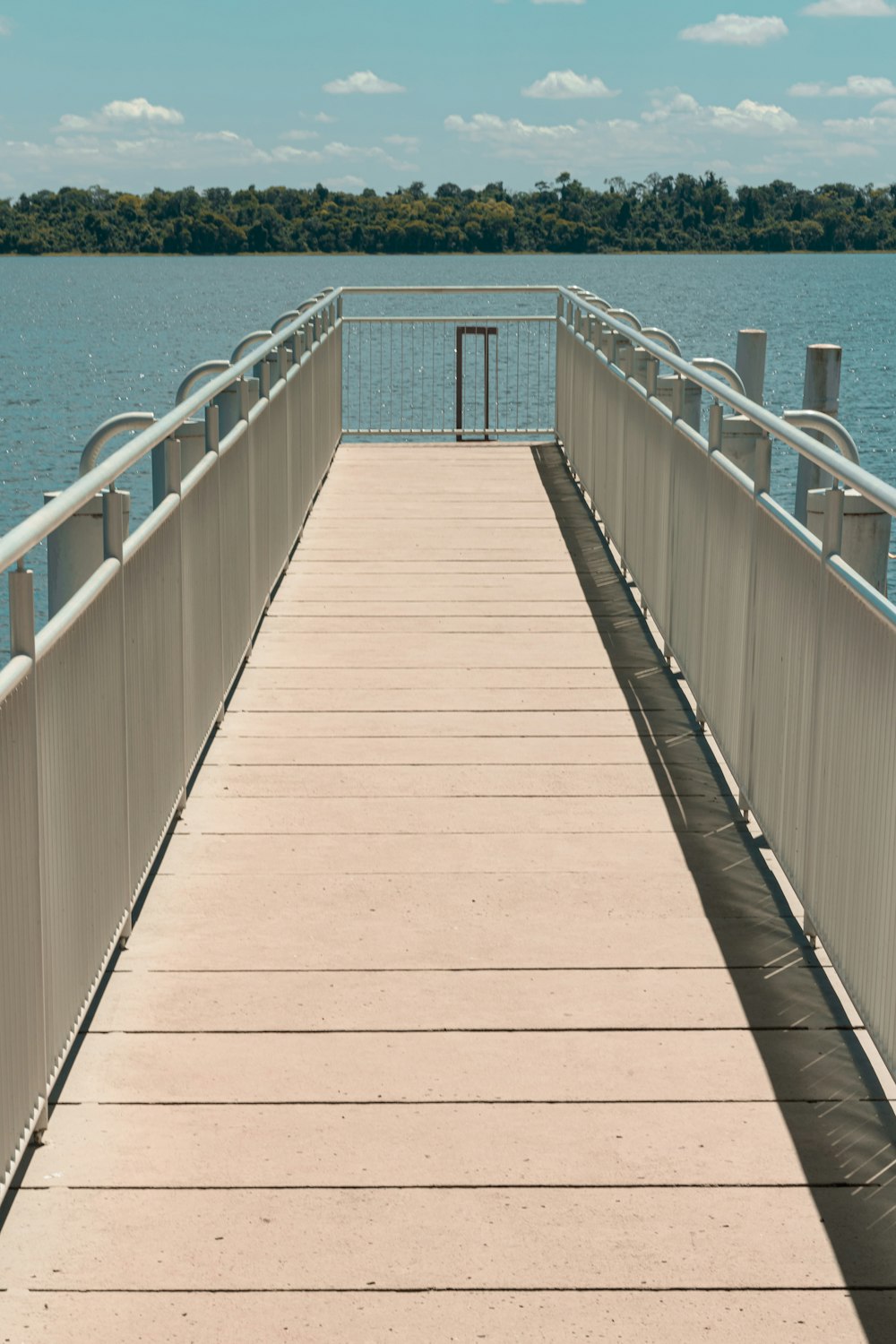 a wooden bridge over a large body of water