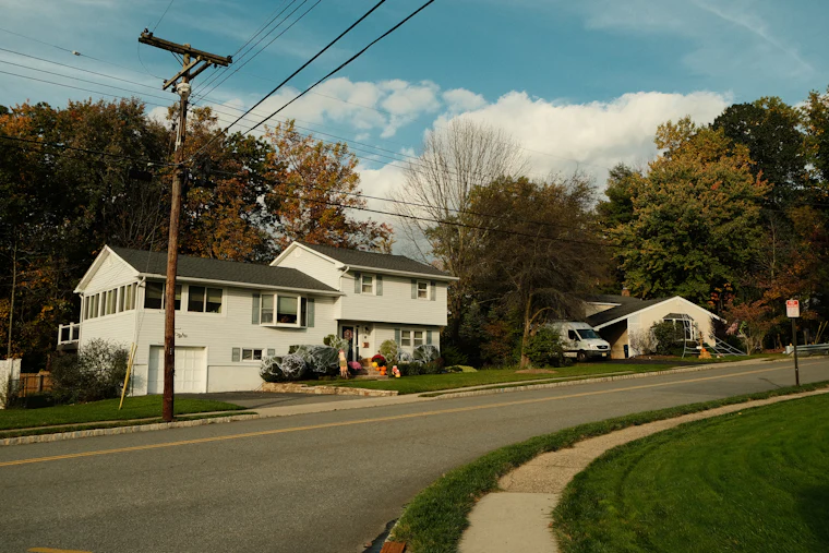 A home on a quiet residential street, typical of neighborhoods in Oakton, VA