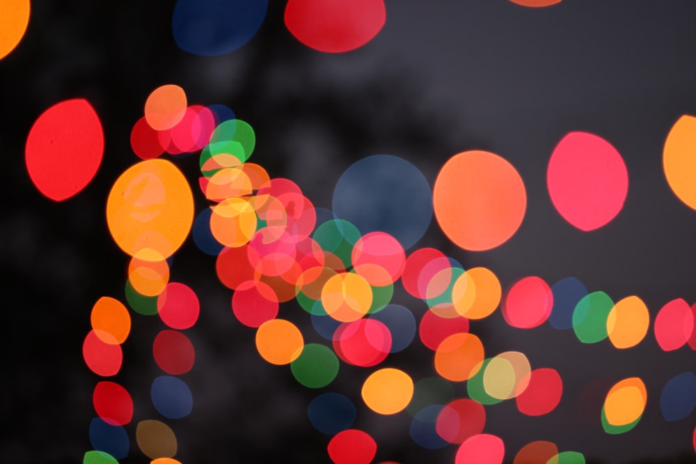 a blurry photo of colorful lights in the dark