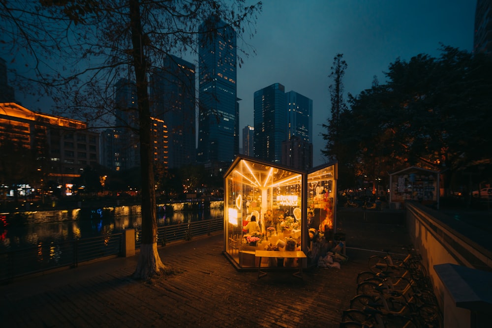 a small cart sitting on the side of a river