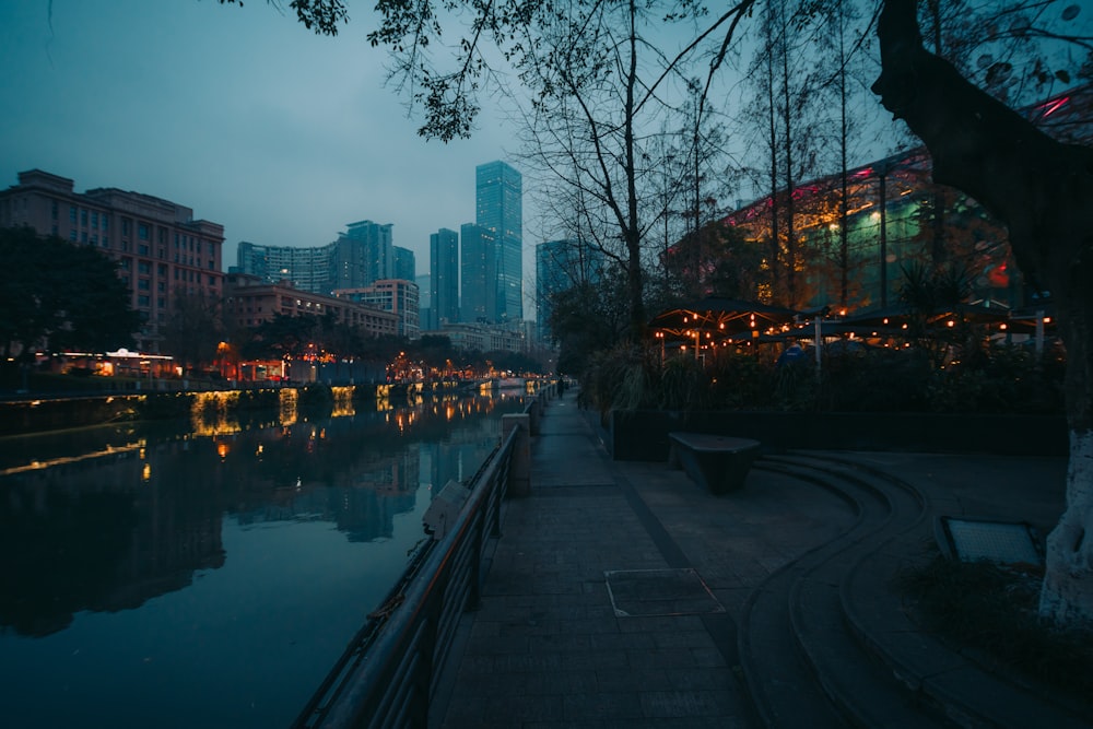 a view of a city at night from across a river