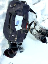 Parcel with outdoor gear being delivered to a snowy northern Canadian doorstep.