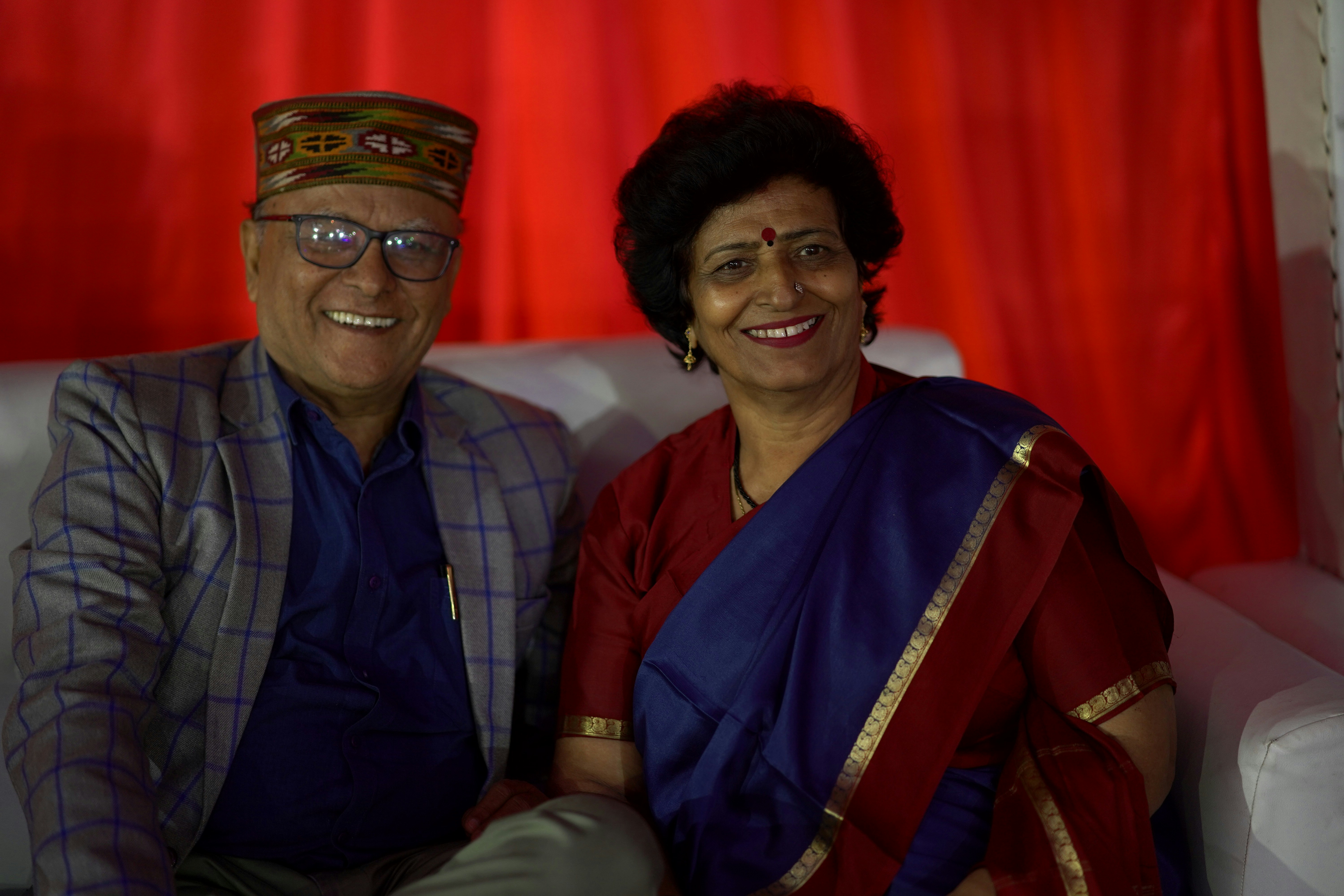 a man and a woman sitting on a couch