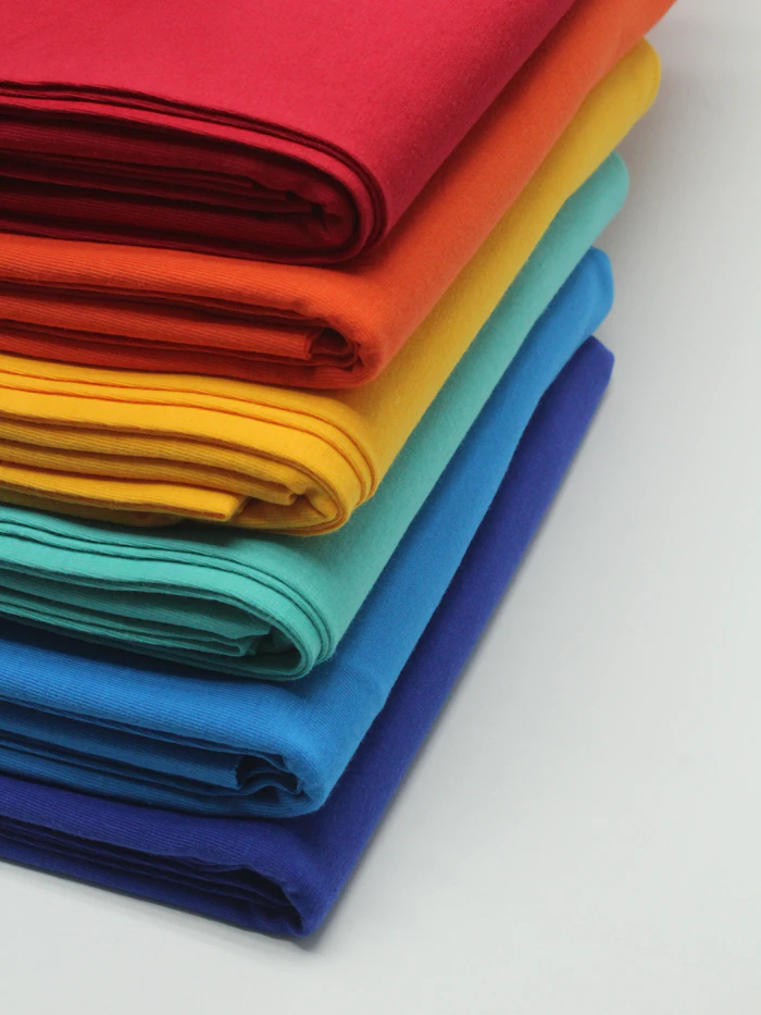 Stack of bright cotton fabric
