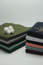 Finished clothing pieces neatly arranged ready for quality inspection.