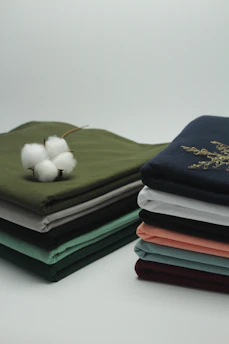 Comfortable cotton pajamas folded neatly on a wooden surface