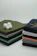 Close-up of soft cotton boxers folded neatly on a wooden surface.