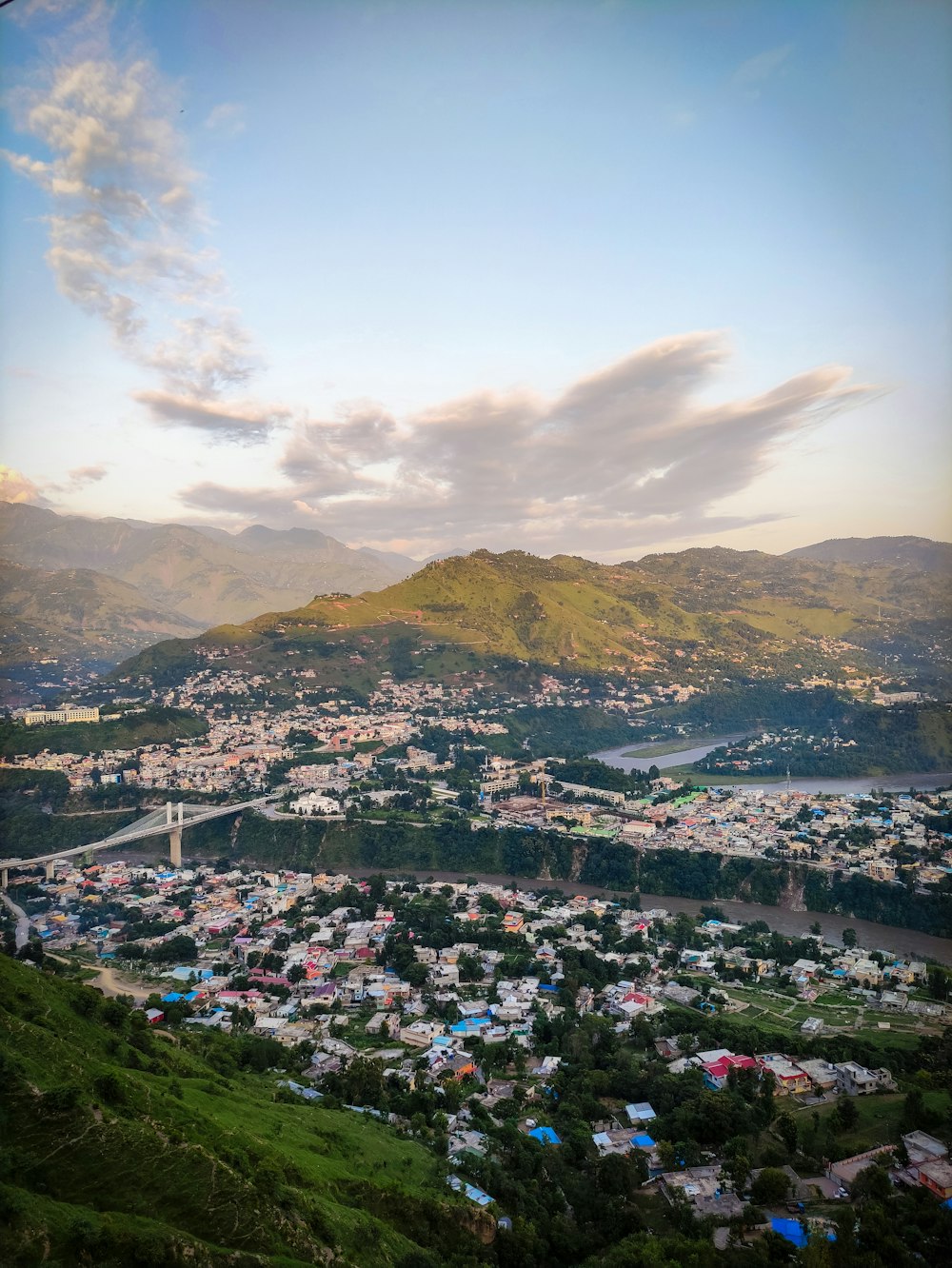 a view of a city from a hill