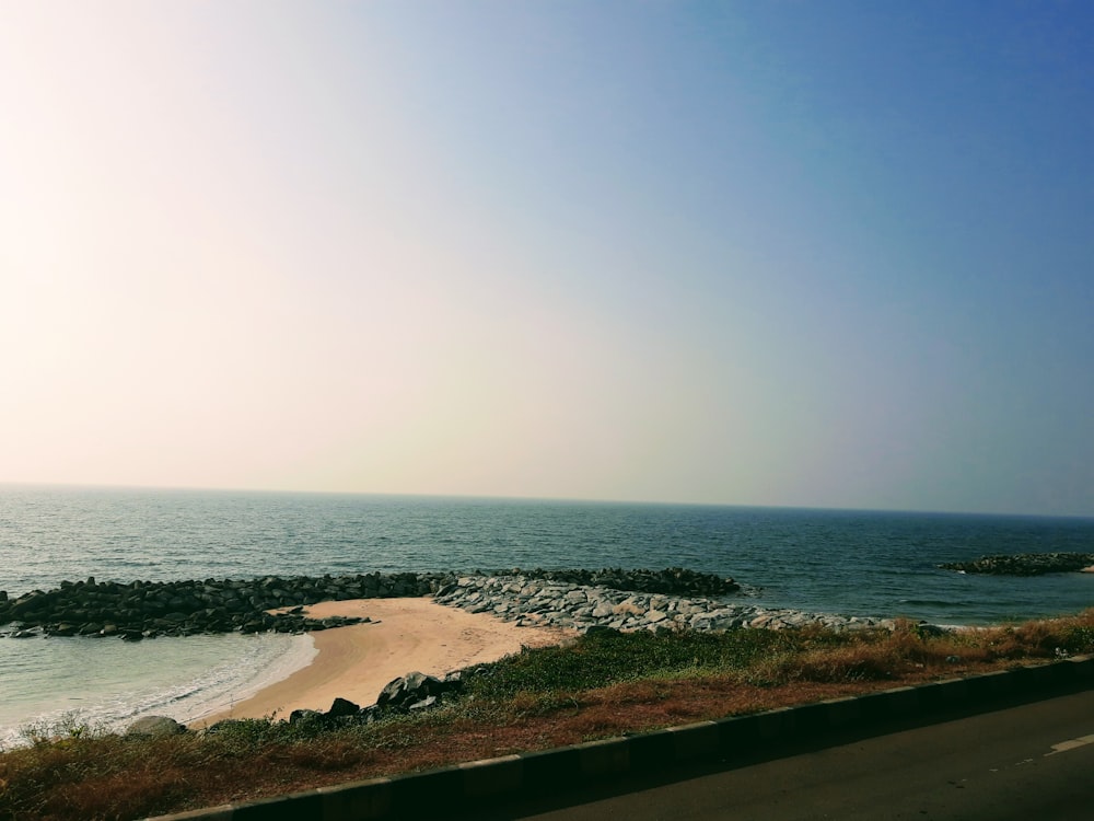 a view of the ocean from a highway