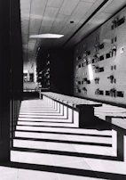 A quiet moment captured in a hospital corridor, reflecting the NHS work that shapes daily life.