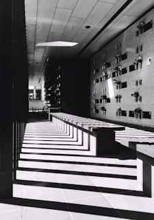 A quiet moment captured in a hospital corridor, reflecting the NHS work that shapes daily life.