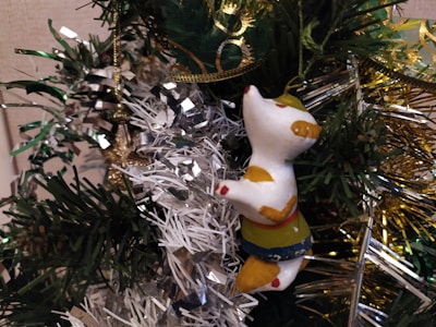 An intricate ceramic ornament with a festive design.