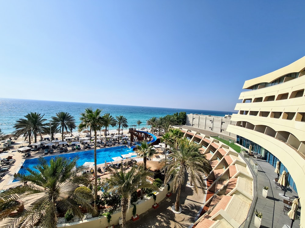 a view of a beach from a hotel room