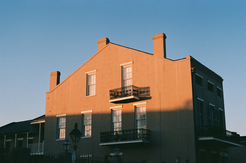 a tall building with a balcony and balconies