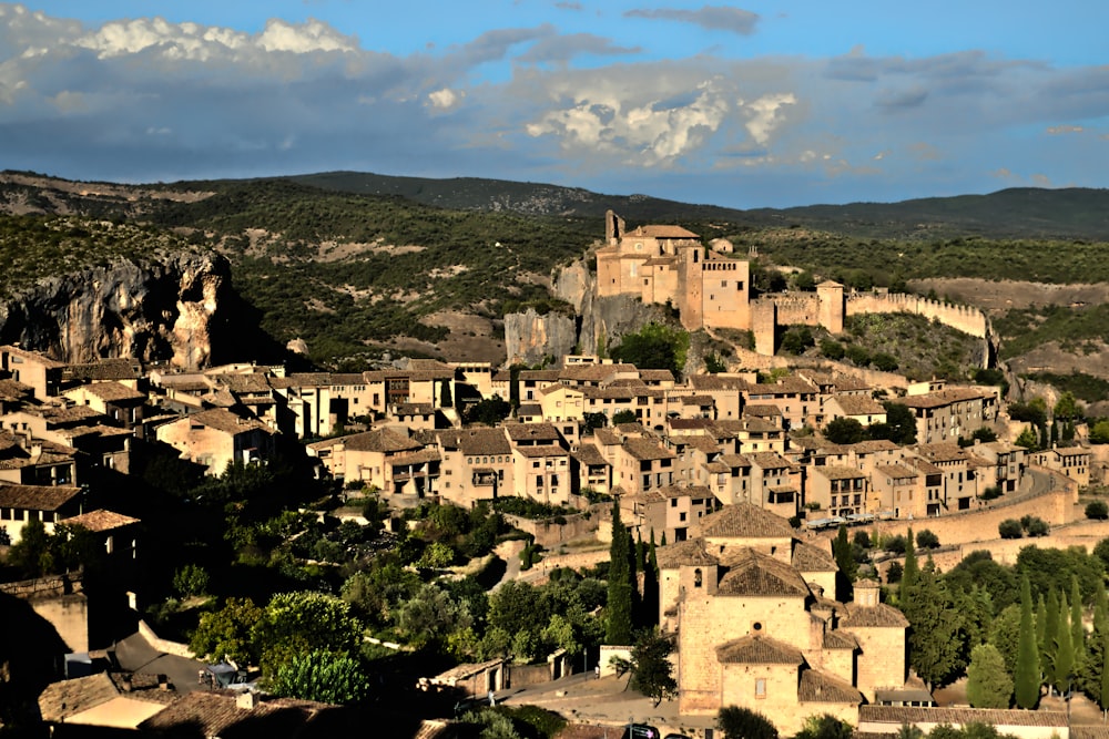 a village in the middle of a mountain range