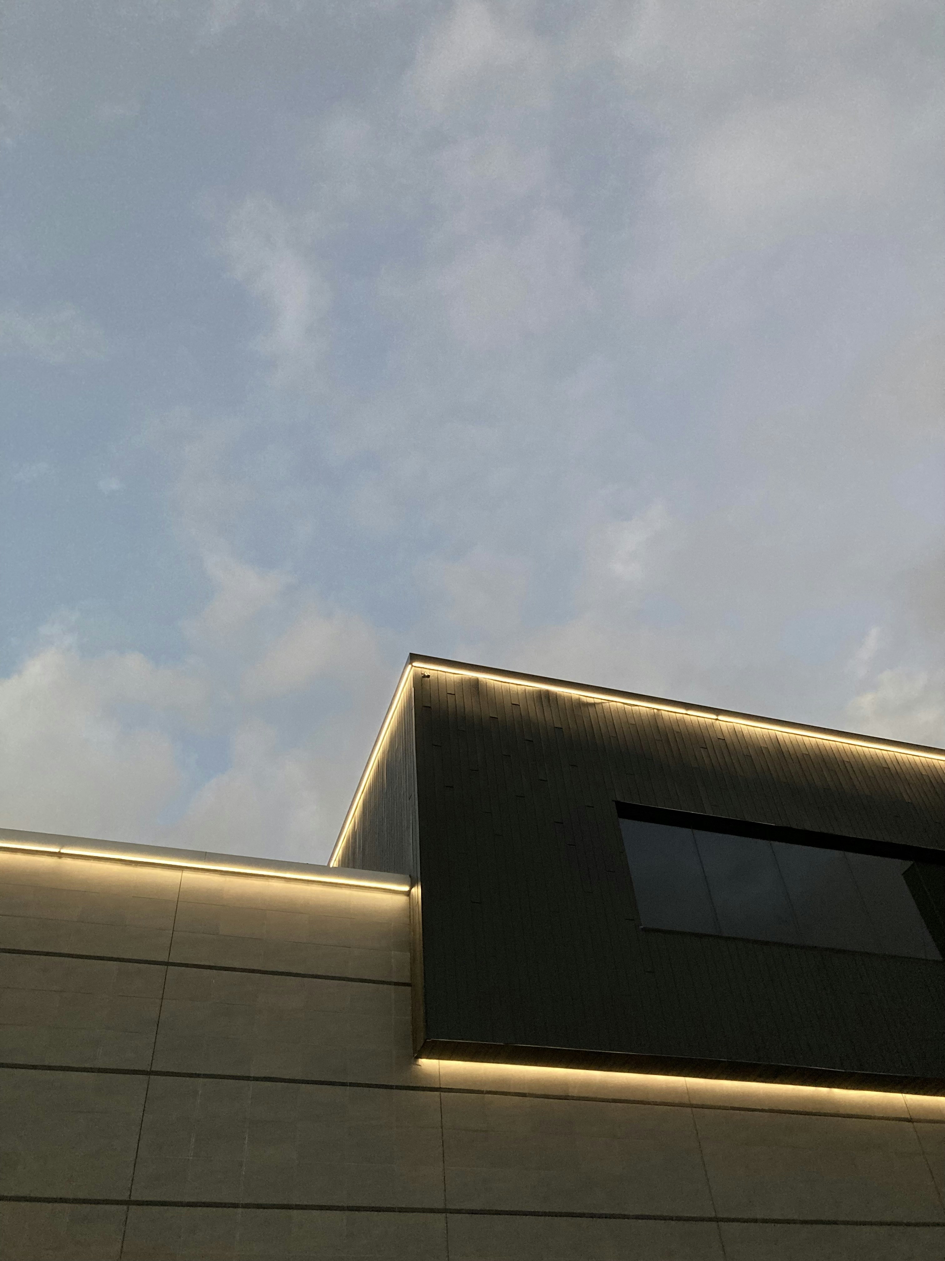 a building with a clock on the side of it