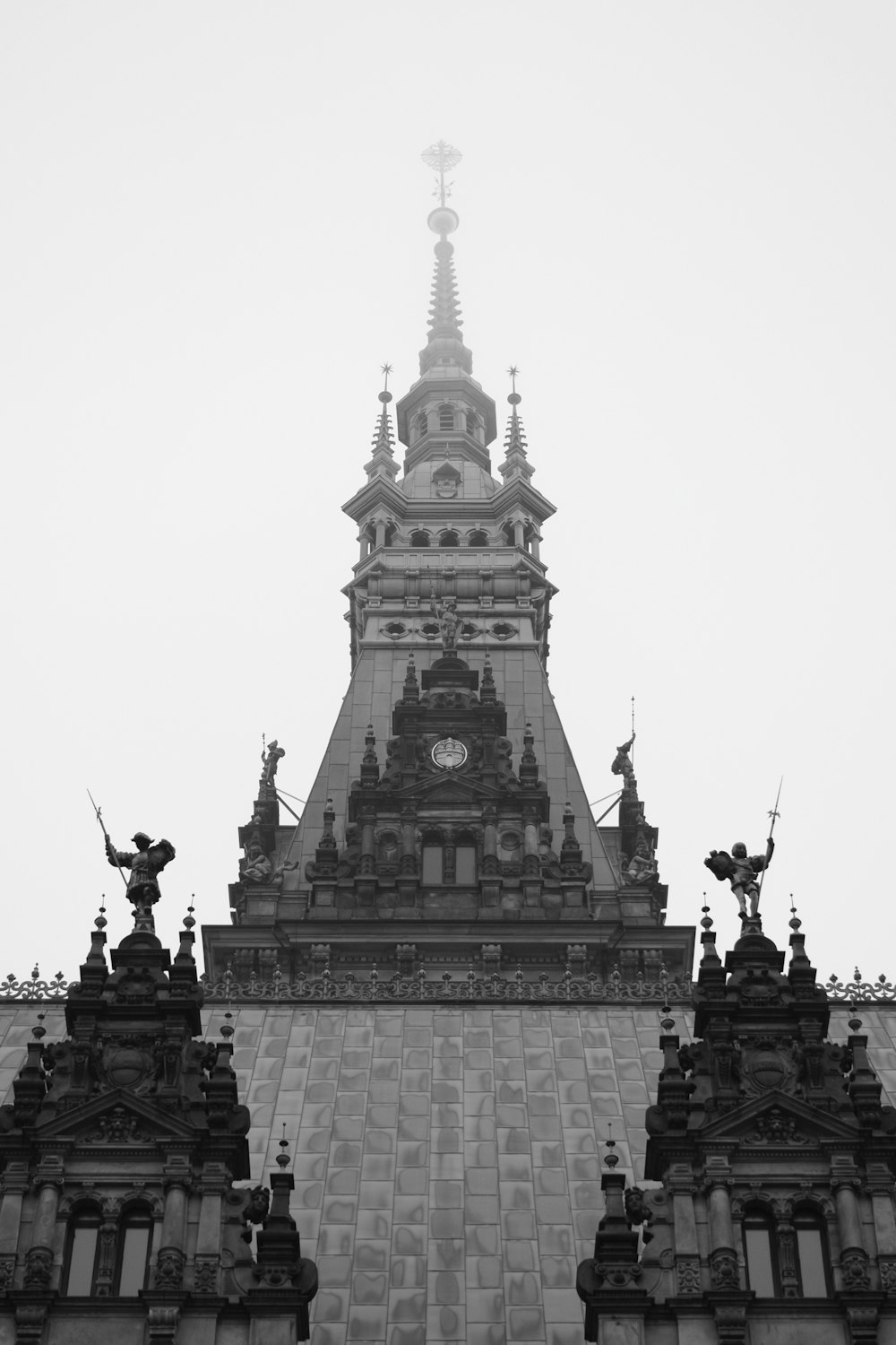 a tall building with a clock on the top of it