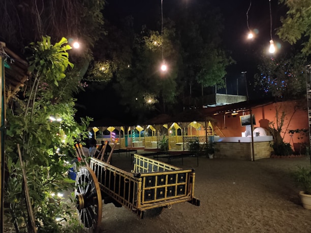 Cozy evening setup with string lights and rustic décor for a private celebration at uik farm stay.