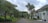 A serene neighborhood with well-maintained houses and green spaces.