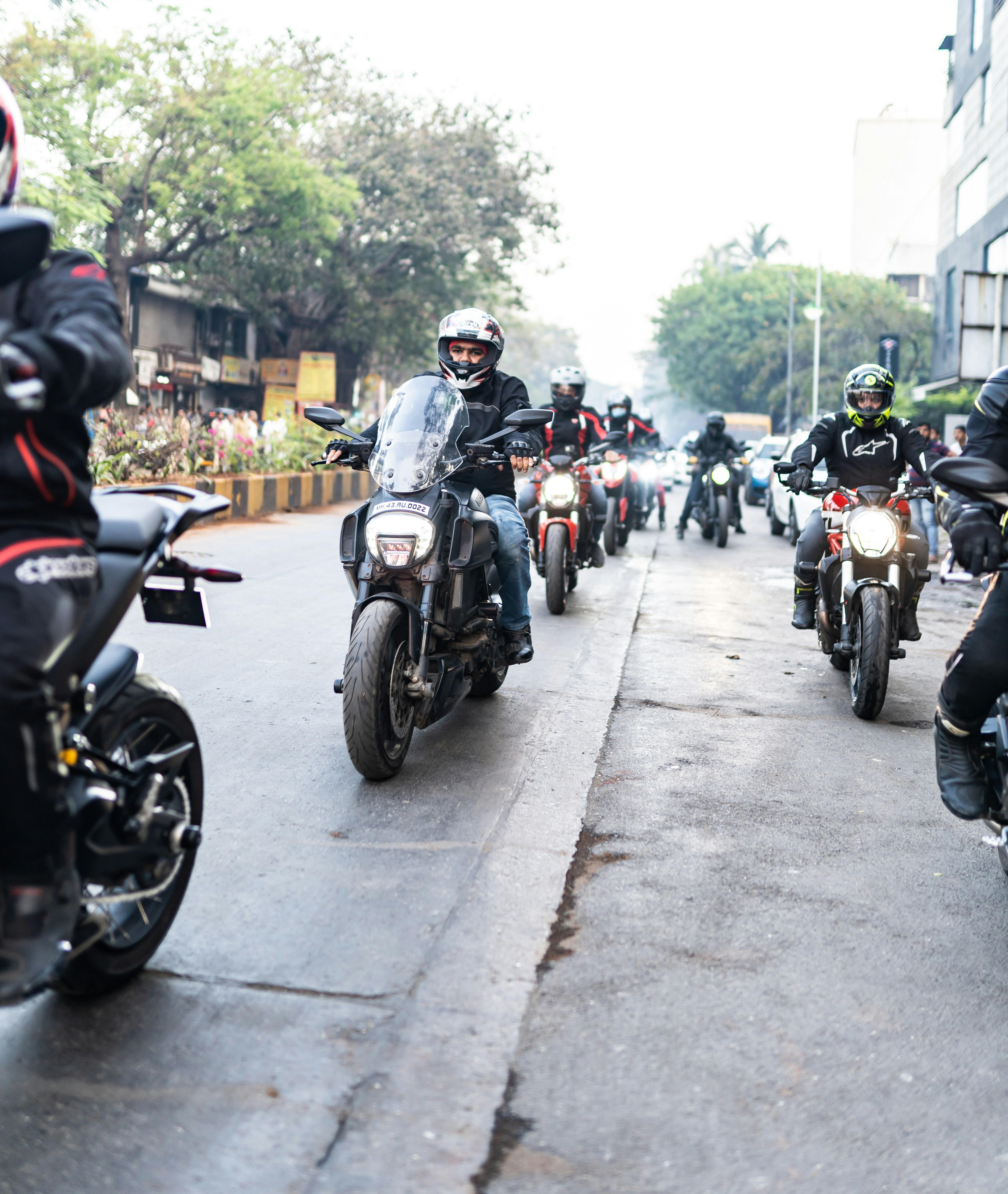a group of police officers riding on the back of a motorcycle