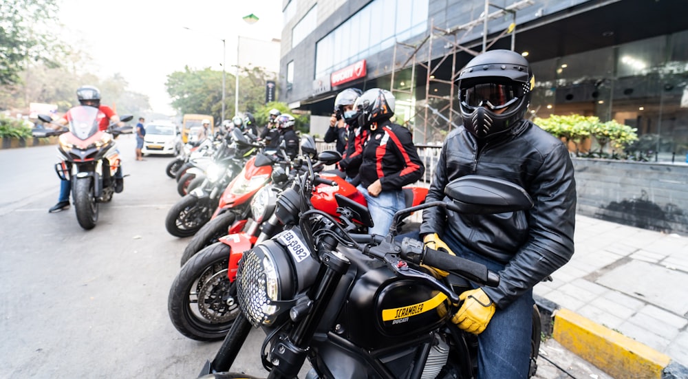 a group of people riding on the back of a motorcycle