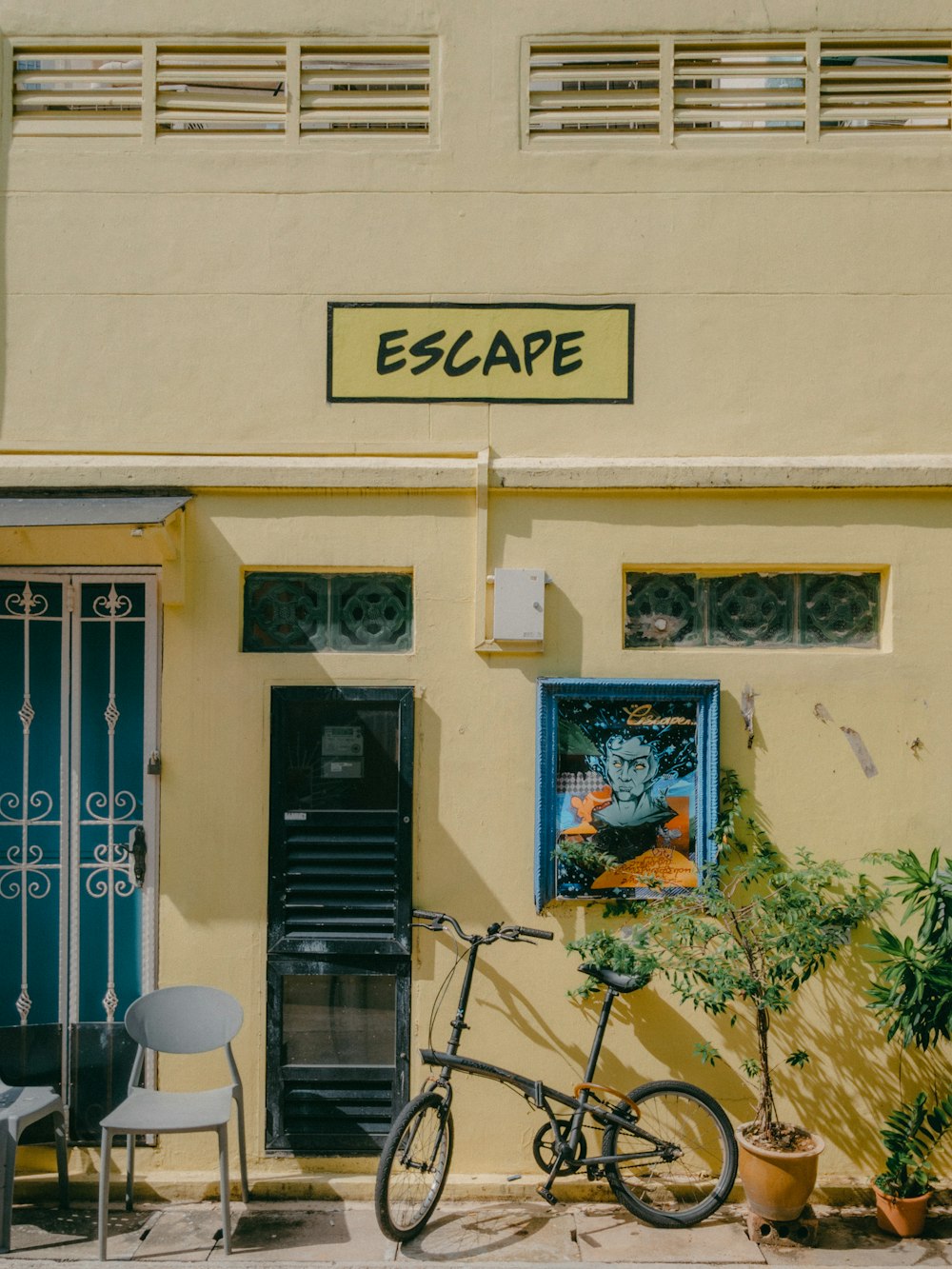 a bicycle parked in front of a building