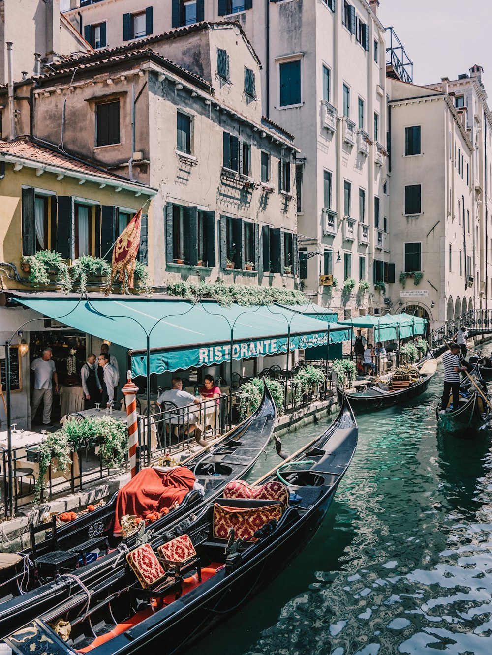 a couple of boats that are sitting in the water