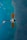 a space shuttle flying over a body of water