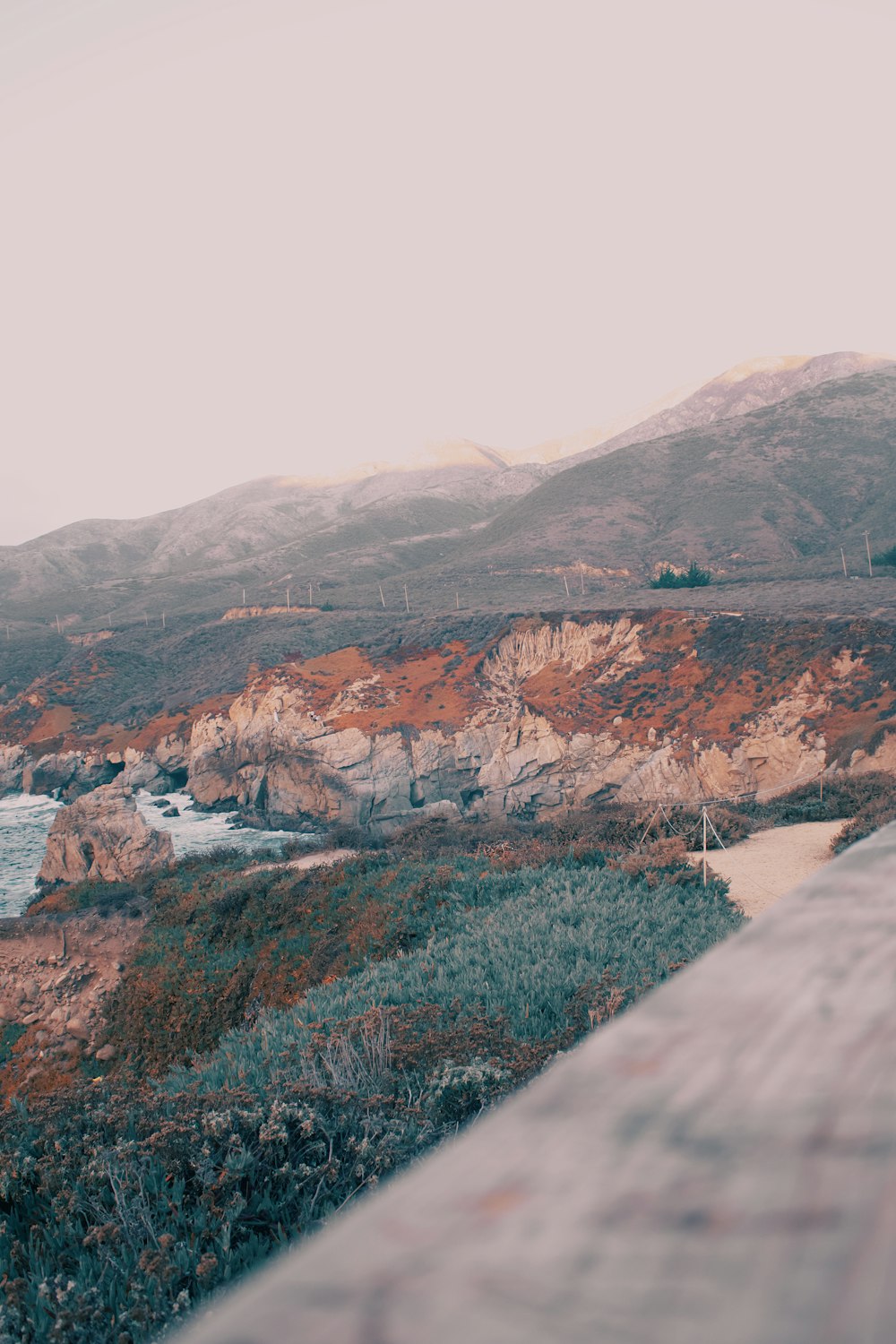 a view of a body of water and mountains