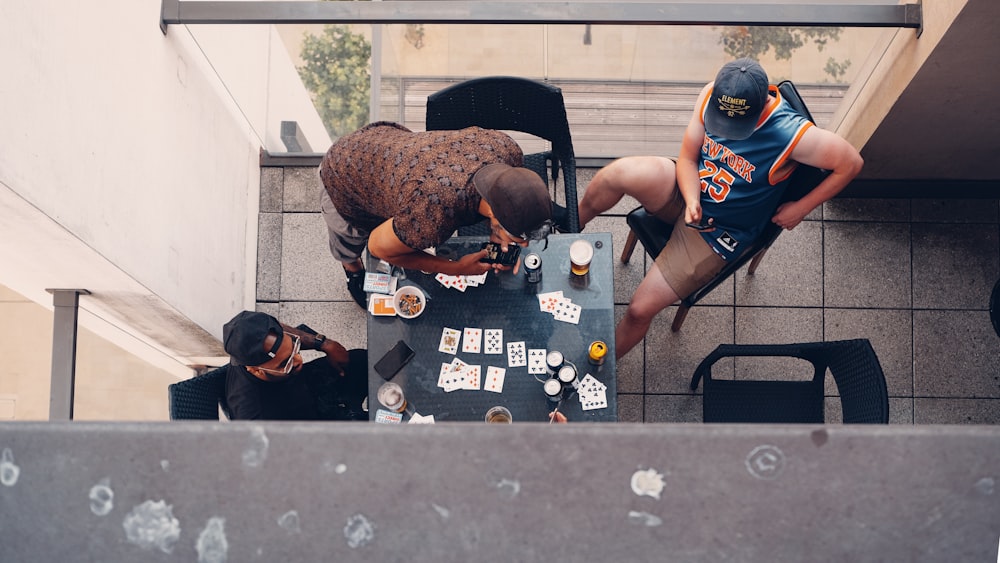 a group of people sitting around a table