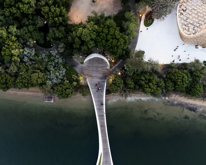 Aerial view of a road bridge crossing a stretch of water