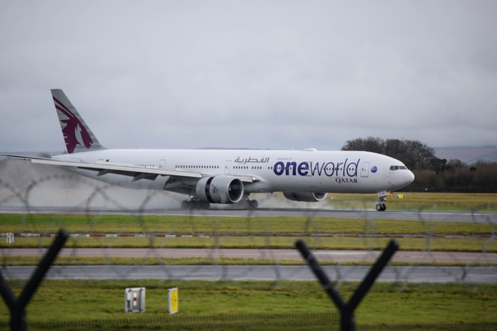 a plane is taking off from a runway