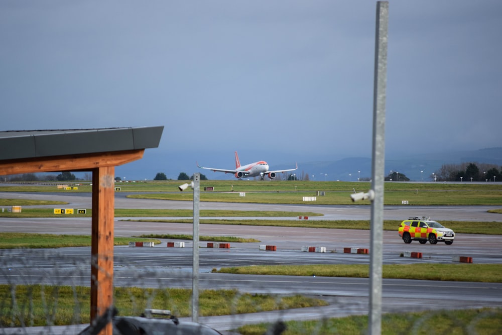 an airport with a plane on the runway
