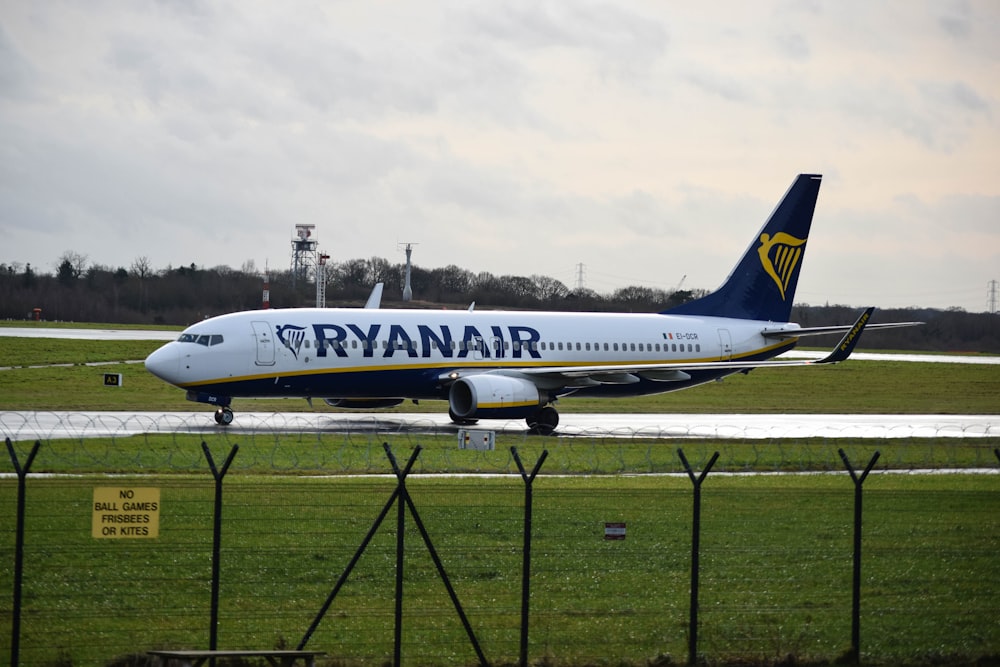 a large jetliner sitting on top of an airport runway