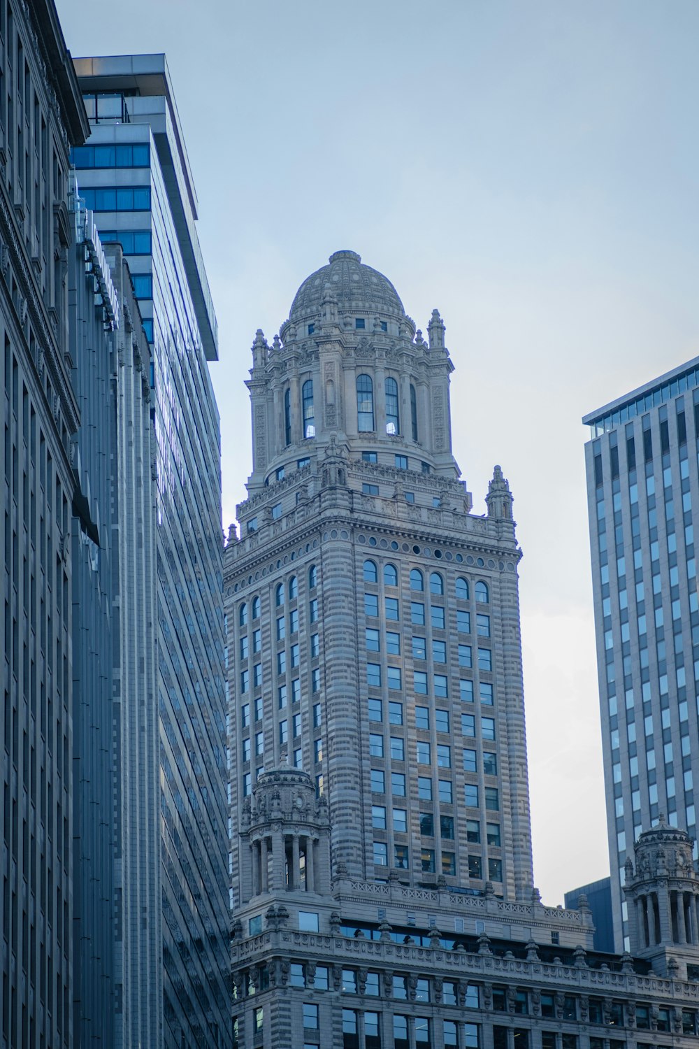 a tall building with a clock on the top of it