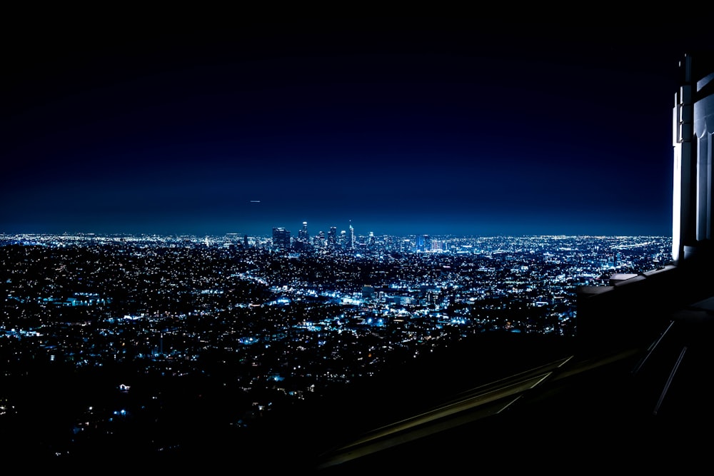 a view of a city at night from a window