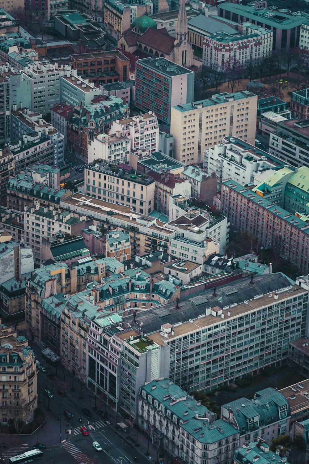 an aerial view of a city with tall buildings