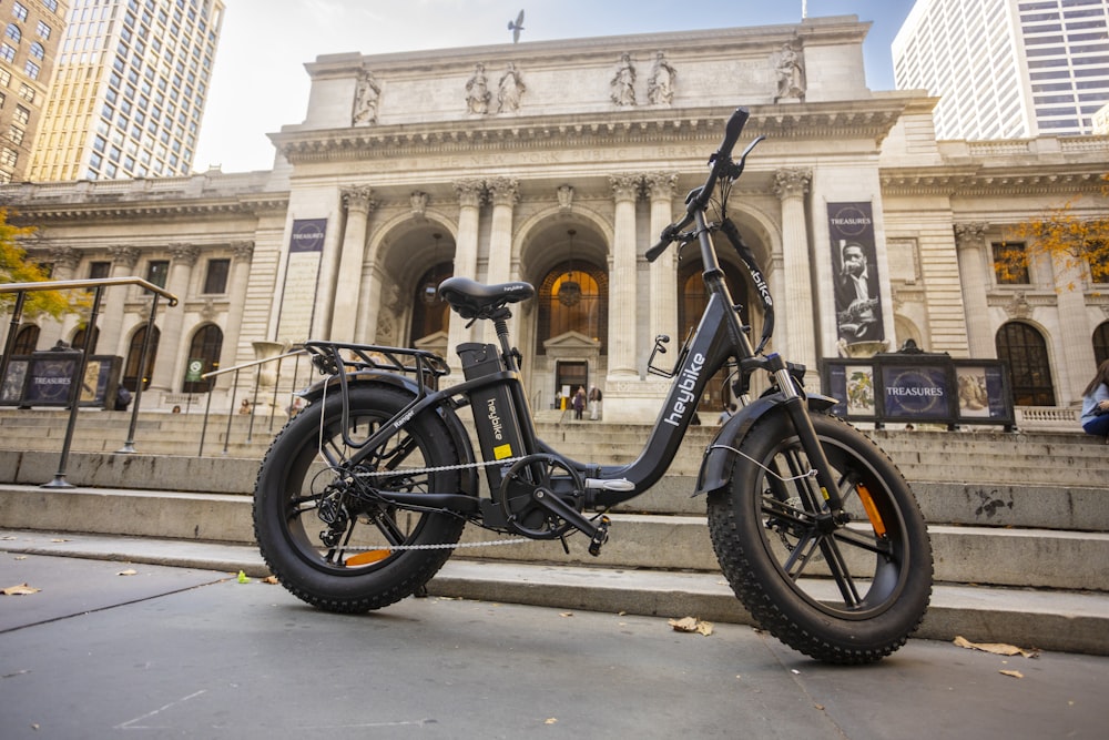 an electric scooter parked in front of a building