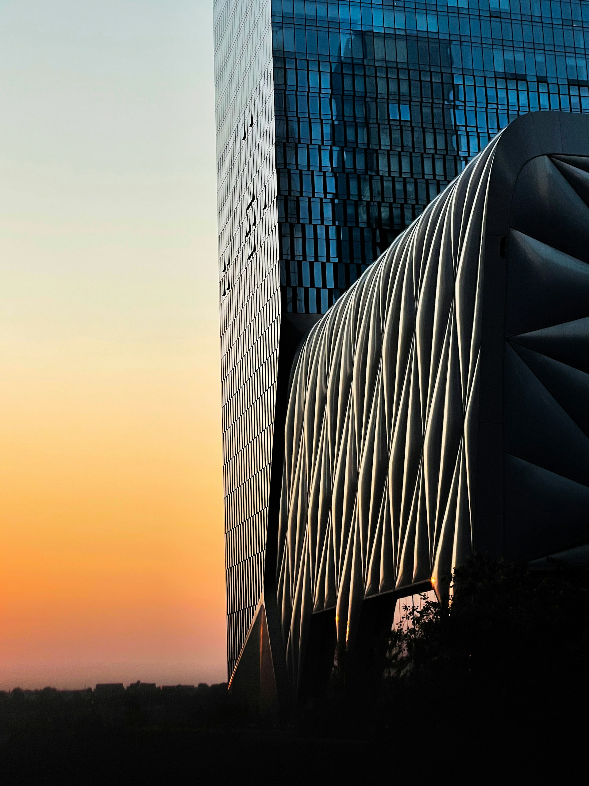 black and brown leather padded tub sofa