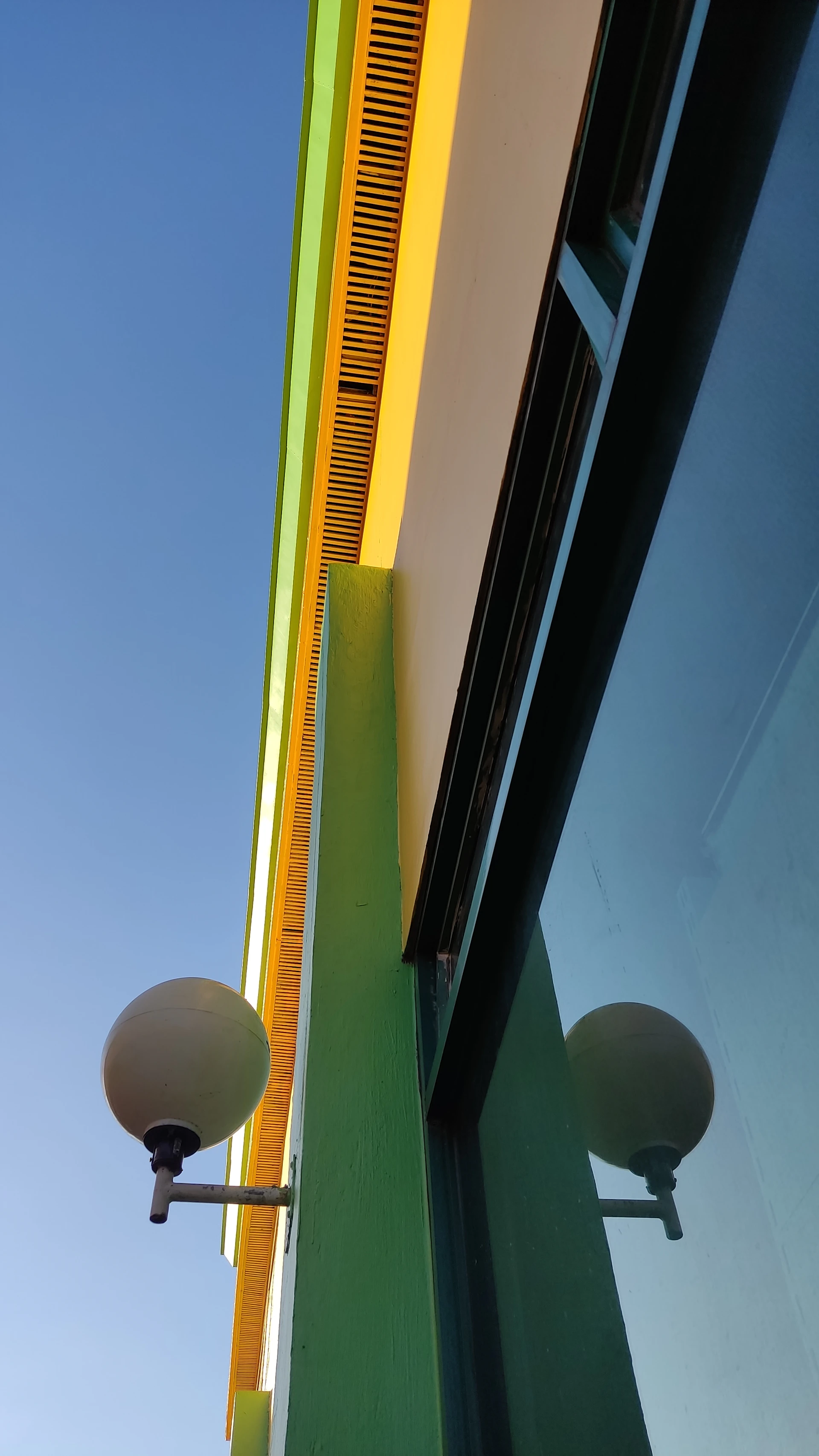 woman wearing yellow long-sleeved dress under white clouds and blue sky during daytime