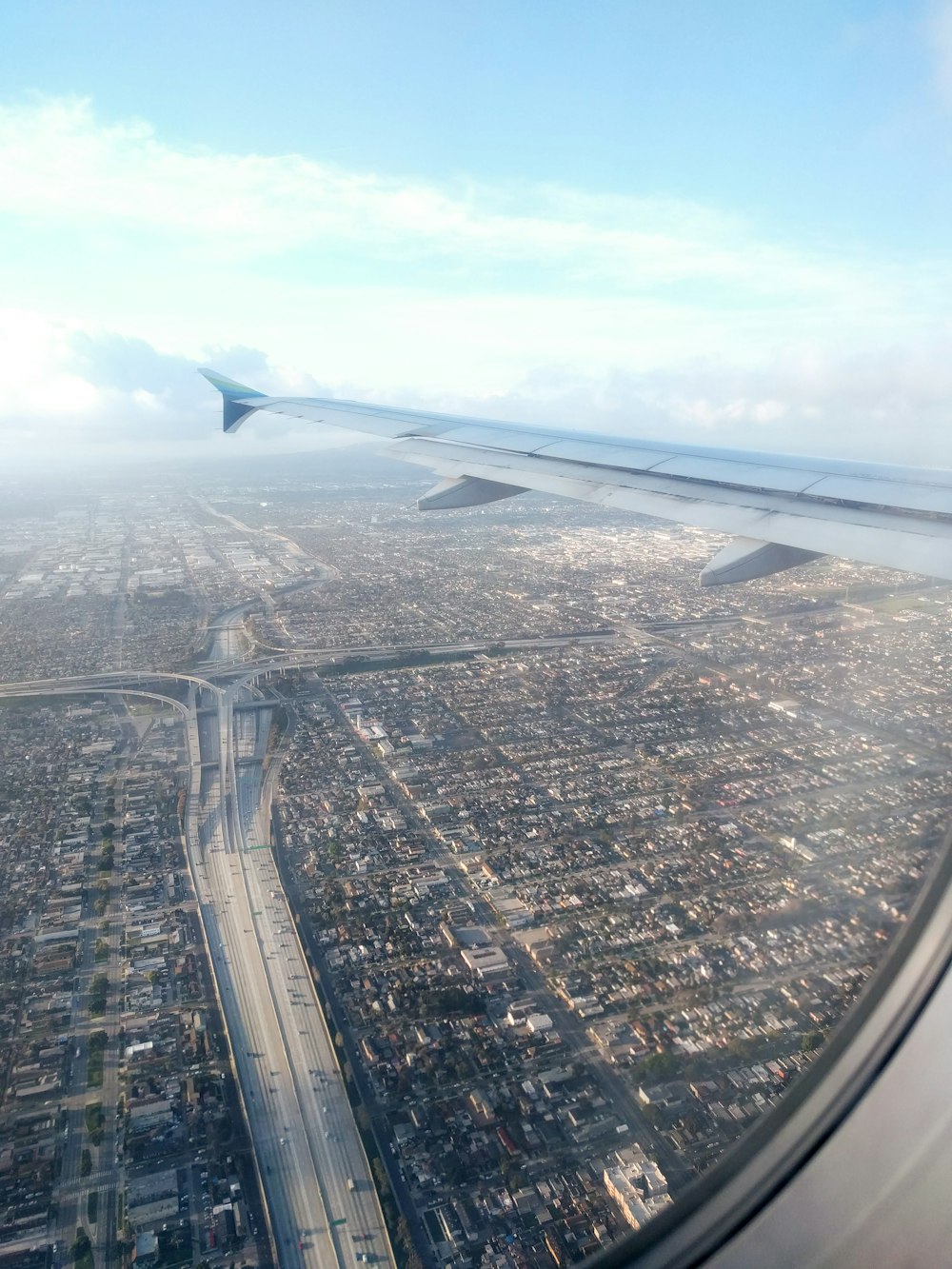 a view of a city from an airplane window