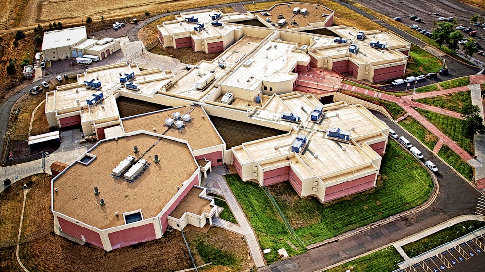 an aerial view of a building with a lot of windows