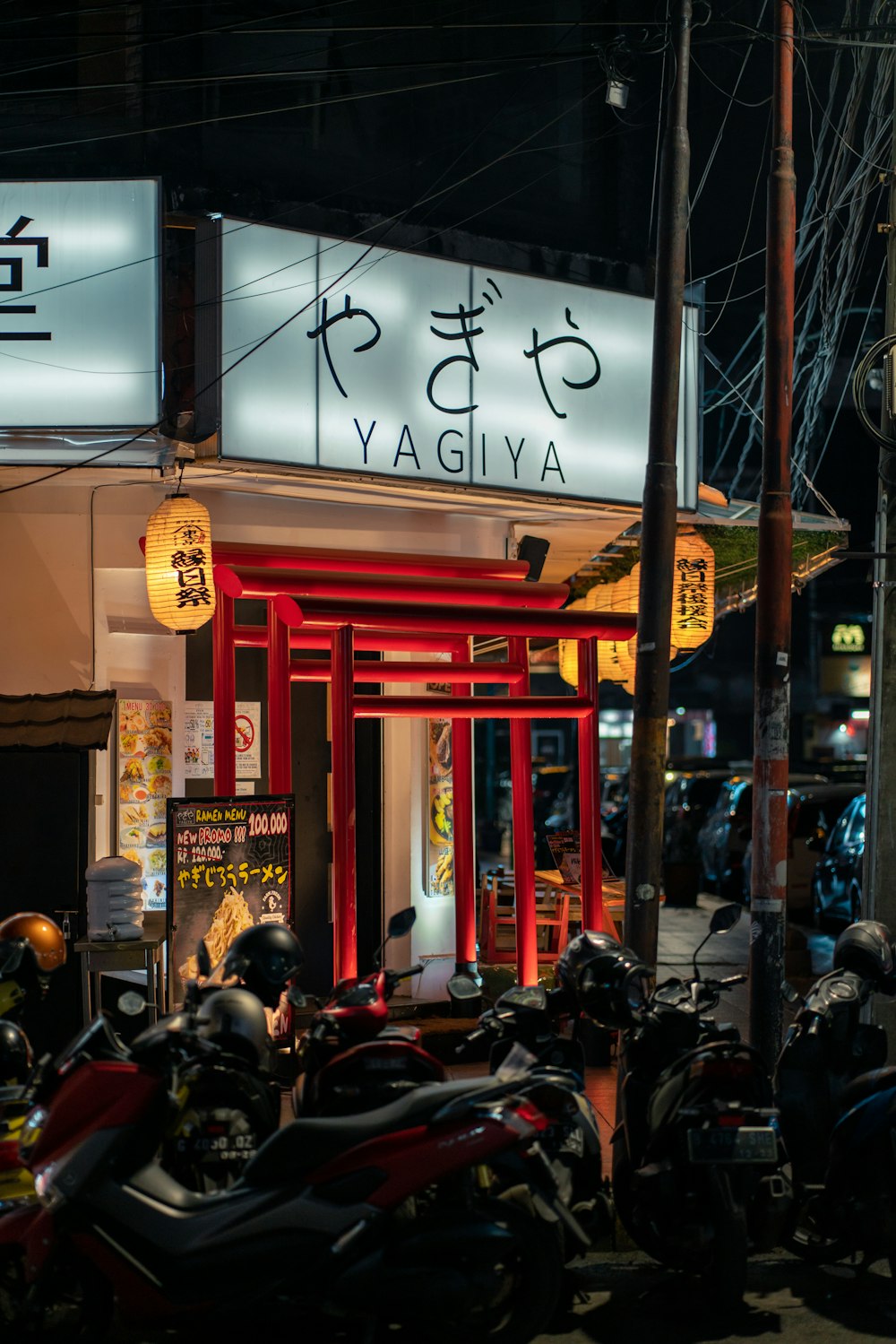 a group of motorcycles parked in front of a building