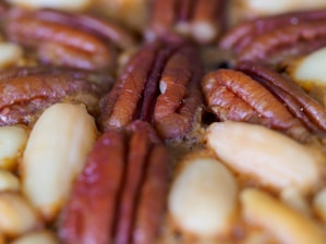 a close up of a plate of food with nuts