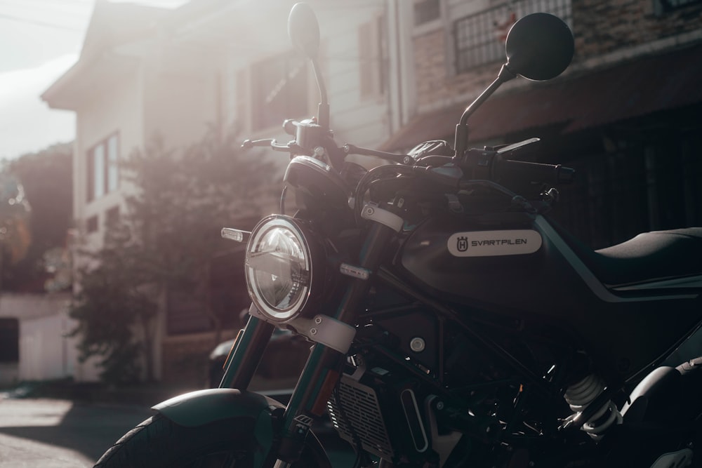 a motorcycle parked on the side of a street