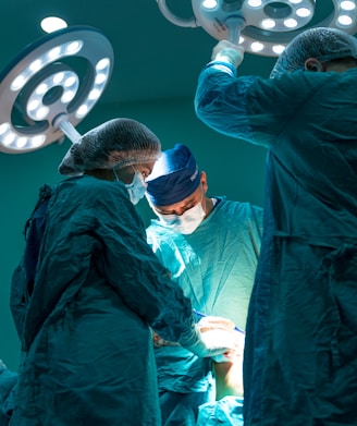 a group of doctors performing surgery on a patient