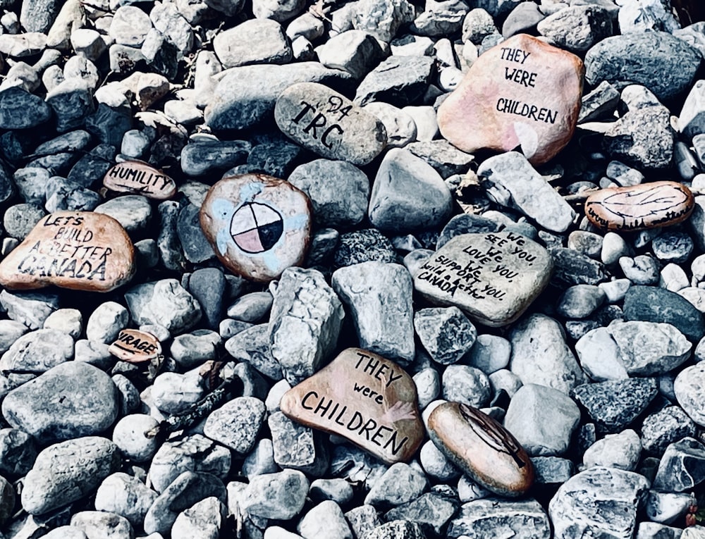 a bunch of rocks that have some writing on them