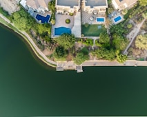 an aerial view of a house with a swimming pool