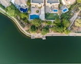 an aerial view of a house with a swimming pool